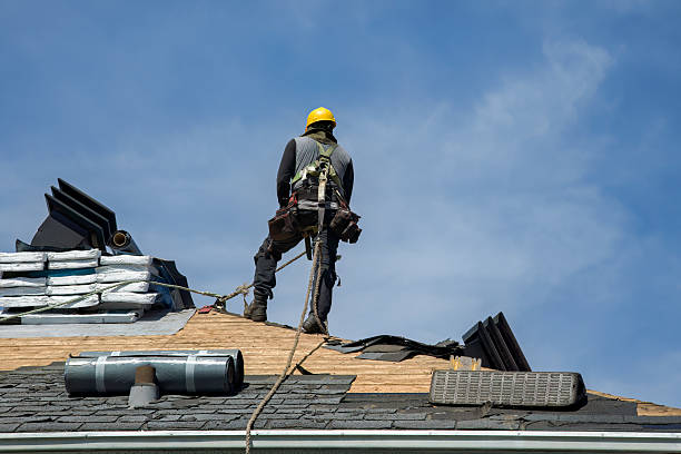Professional Roofing technician working in Seneca, OR